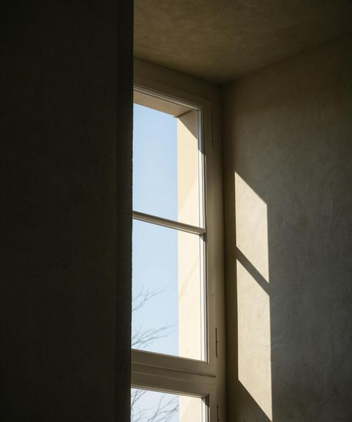 A serene, abstract image suggesting calmness and balance, with soft lines.